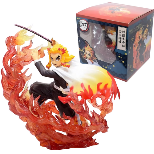 Animated character figurine with flames and packaging in the background. Demon Slayer