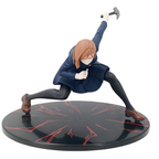 Figurine of a character in a dynamic pose with an axe on a black base