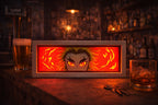 ScandiAnime Rengoku Aura Lamp glowing with vibrant orange and yellow hues, showcasing an anime-inspired design on a sleek base.