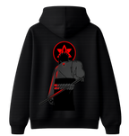 Black Sasuke Uchiha hoodie by ScandiAnime featuring a front graphic of Sasuke's face and Sharingan eye design.
