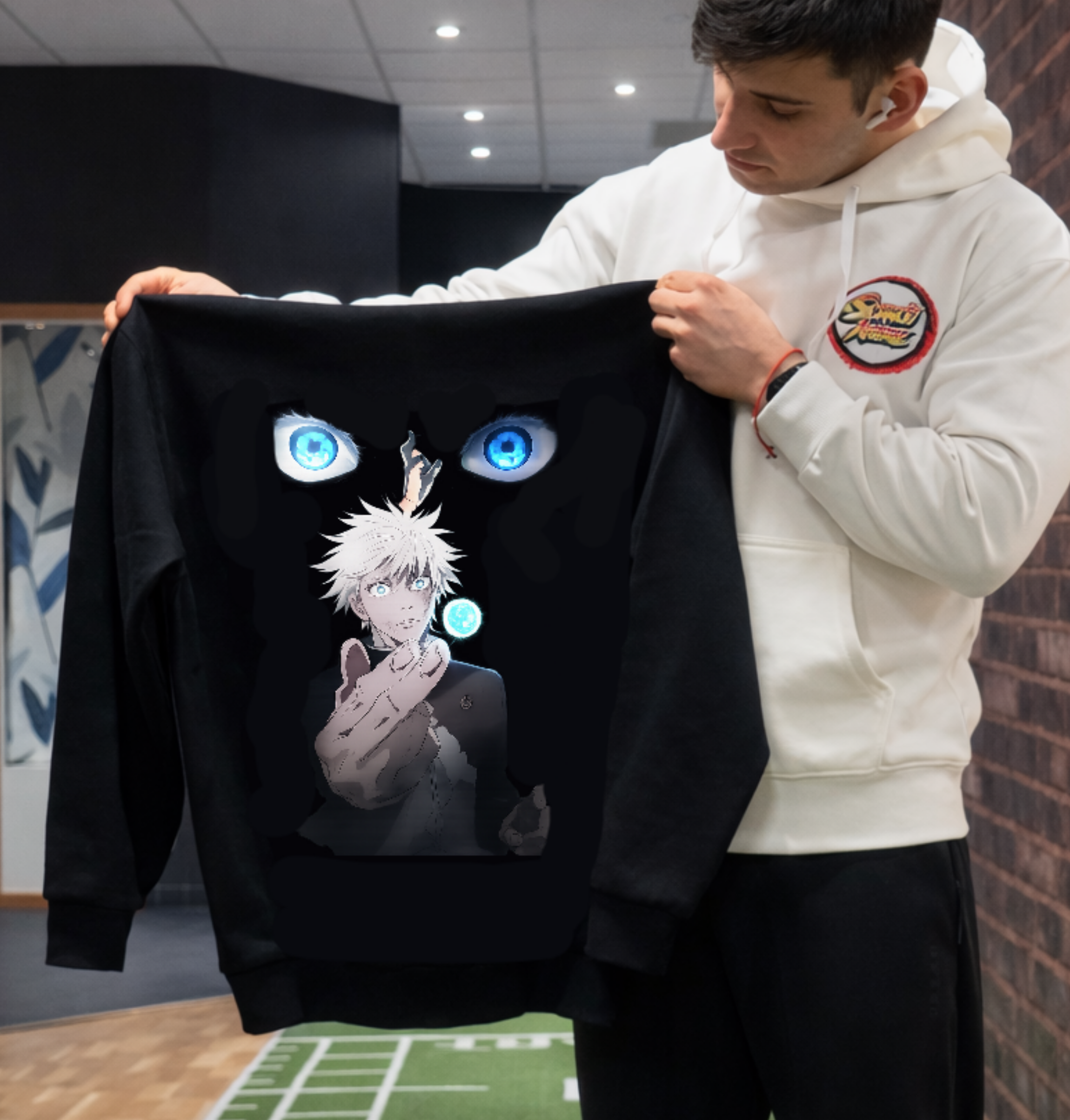 ScandiAnime Gojo Hoodie showing front view, soft fabric, and detailed design with a hood and logo on a plain background.