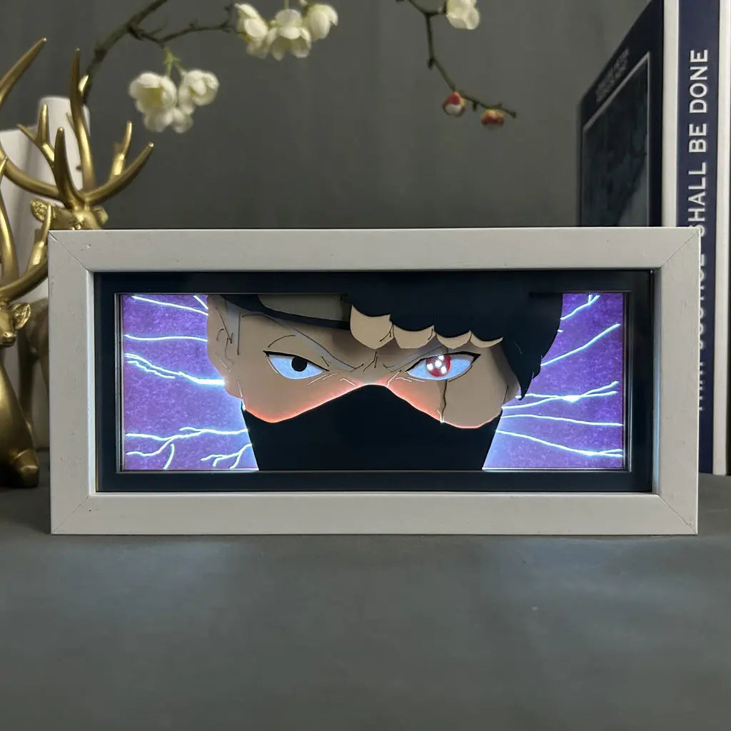 ScandiAnime Kakashi Hatake Aura Lamp illuminated with vibrant blue and white colors, showcasing the detailed character design.