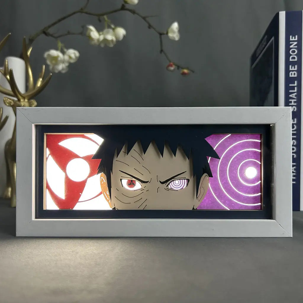 Obito Uchiha Aura Lamp by ScandiAnime, featuring a detailed LED light display of Obito Uchiha from Naruto, glowing with vibrant colors.