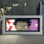 Obito Uchiha Aura Lamp by ScandiAnime, featuring a detailed LED light display of Obito Uchiha from Naruto, glowing with vibrant colors.